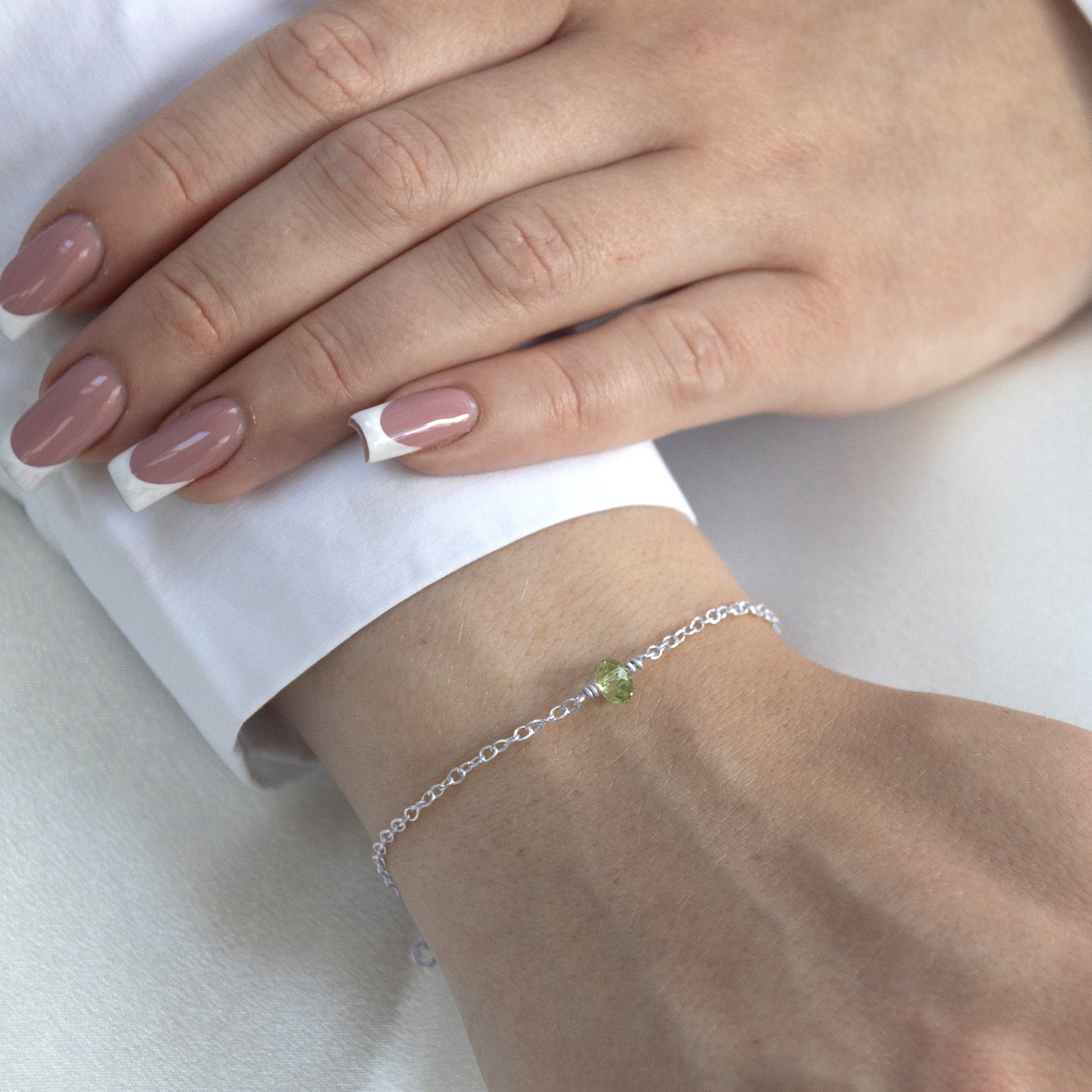 August_birthstone_bracelet_silver_on_a_model_sml