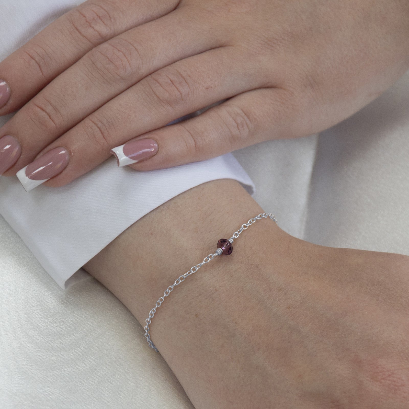 February_birthstone_bracelet_silver_on_a_model