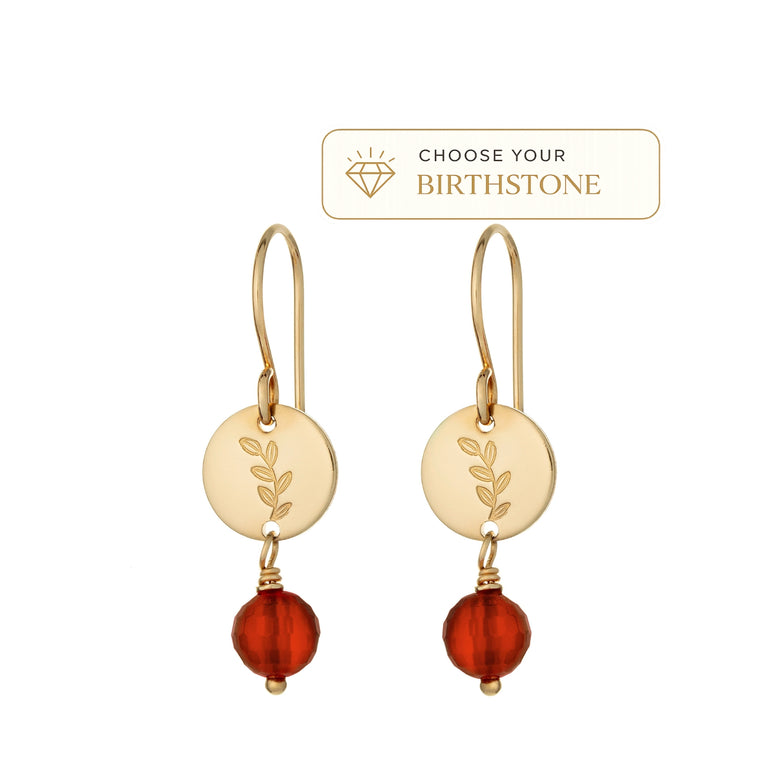 A pair of gold drop earrings with engraved circular discs and carnelian birthstone shown on a white background with a 'Choose Your Birthstone' label above.
