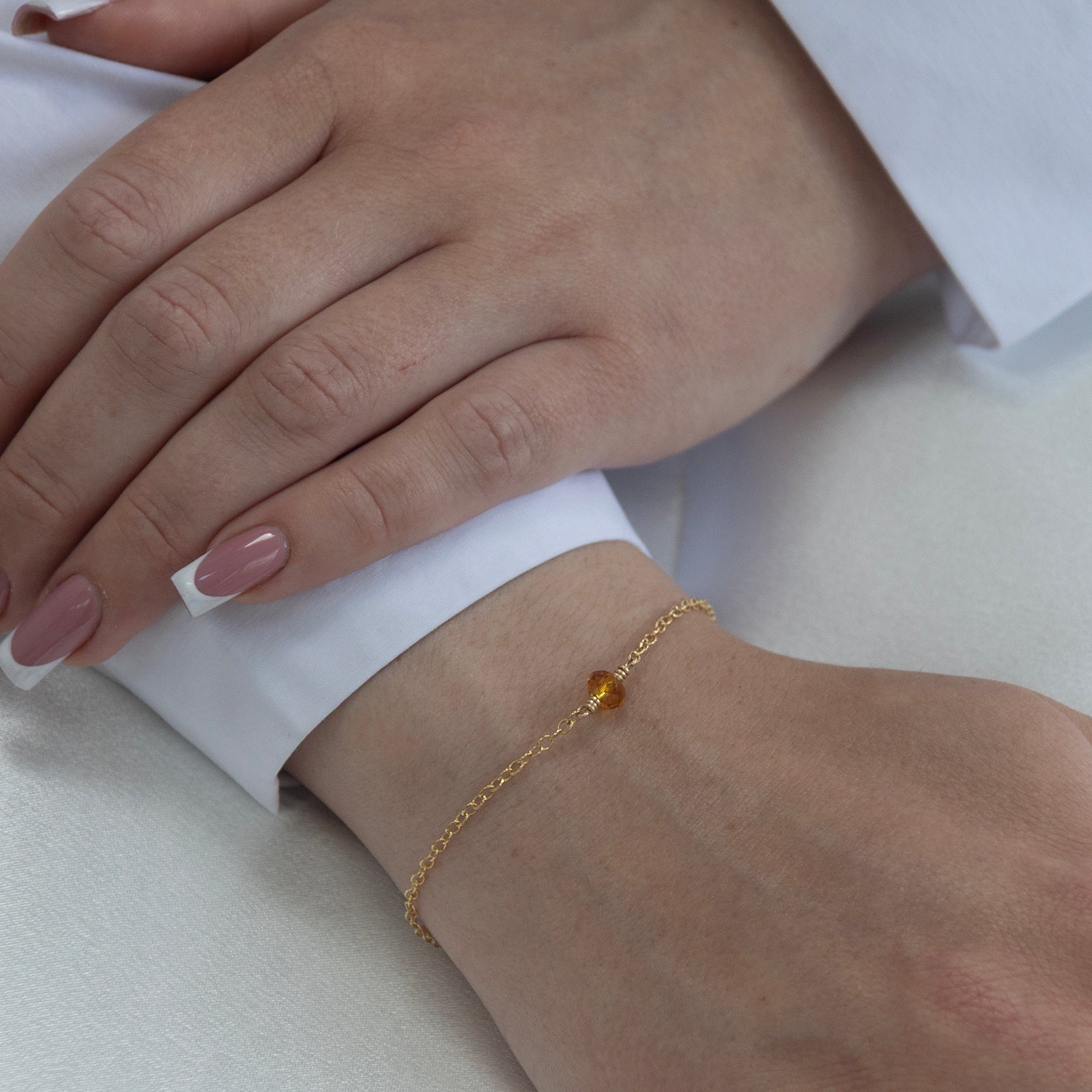 november birthstone bracelet gold on a model 