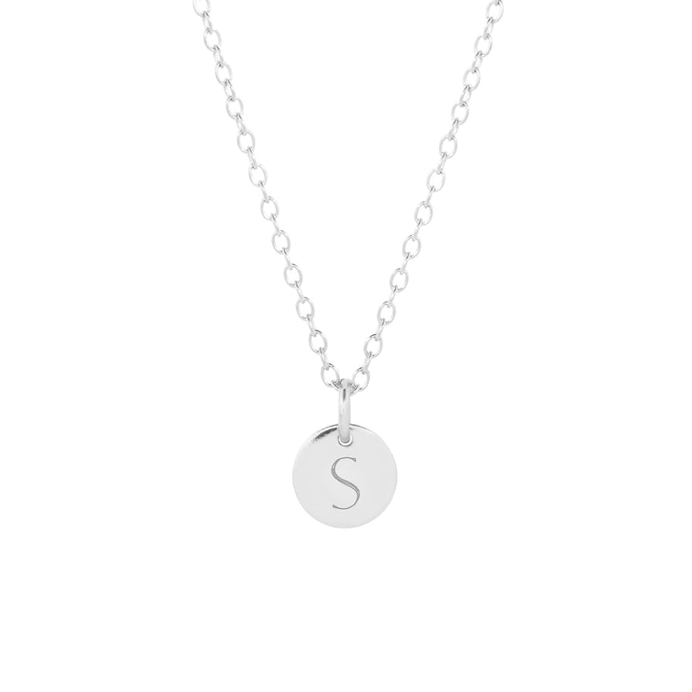 dainty engraved sterling silver initial necklace with a single disc product shot