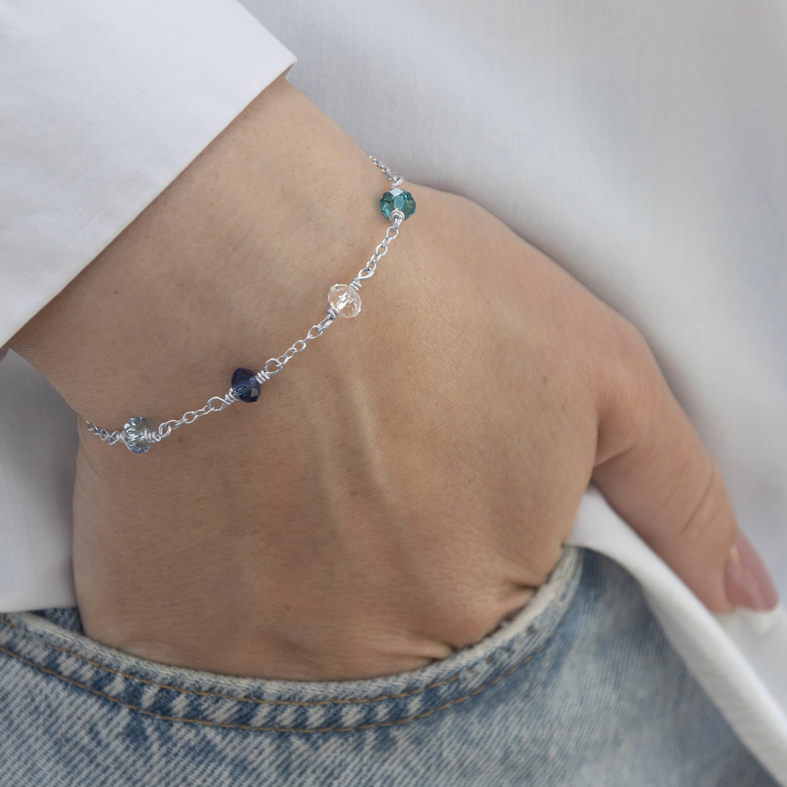 family_birthstone_bracelet_4_birthstones_on_a_model_silver