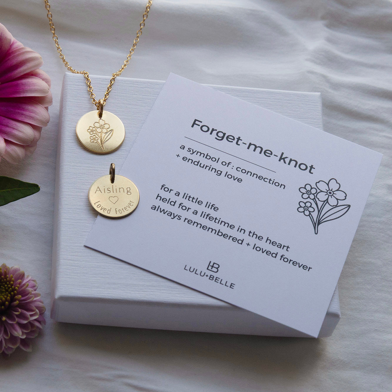 lifestyle image of forget me not memorial necklace with meaning card 
