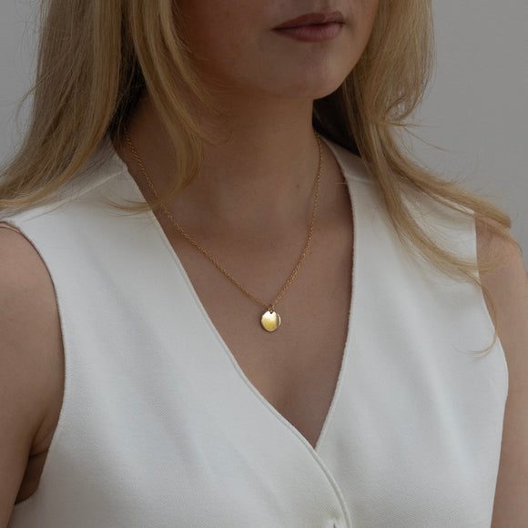 medium gold initial necklace two or more discs 