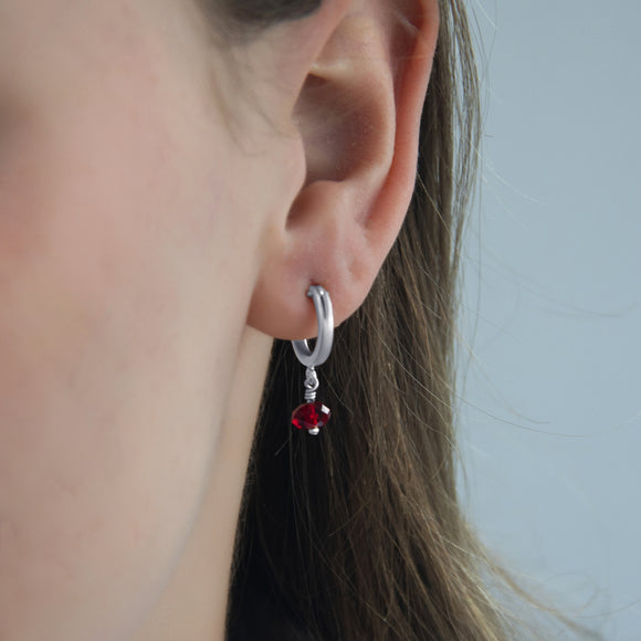 july birthstone hoop earrings with ruby crystal in sterling silver 