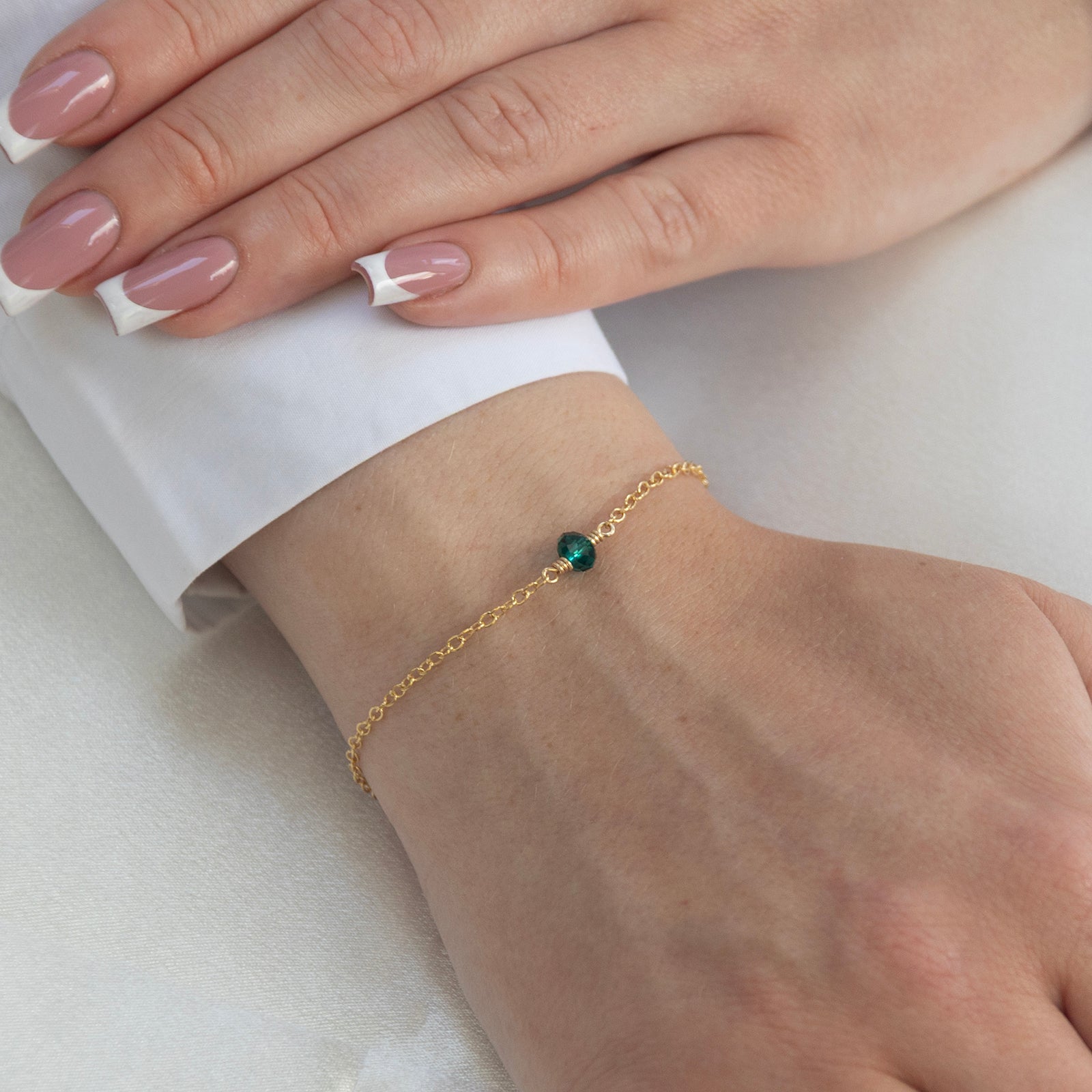 may birthstone bracelet gold on a model 