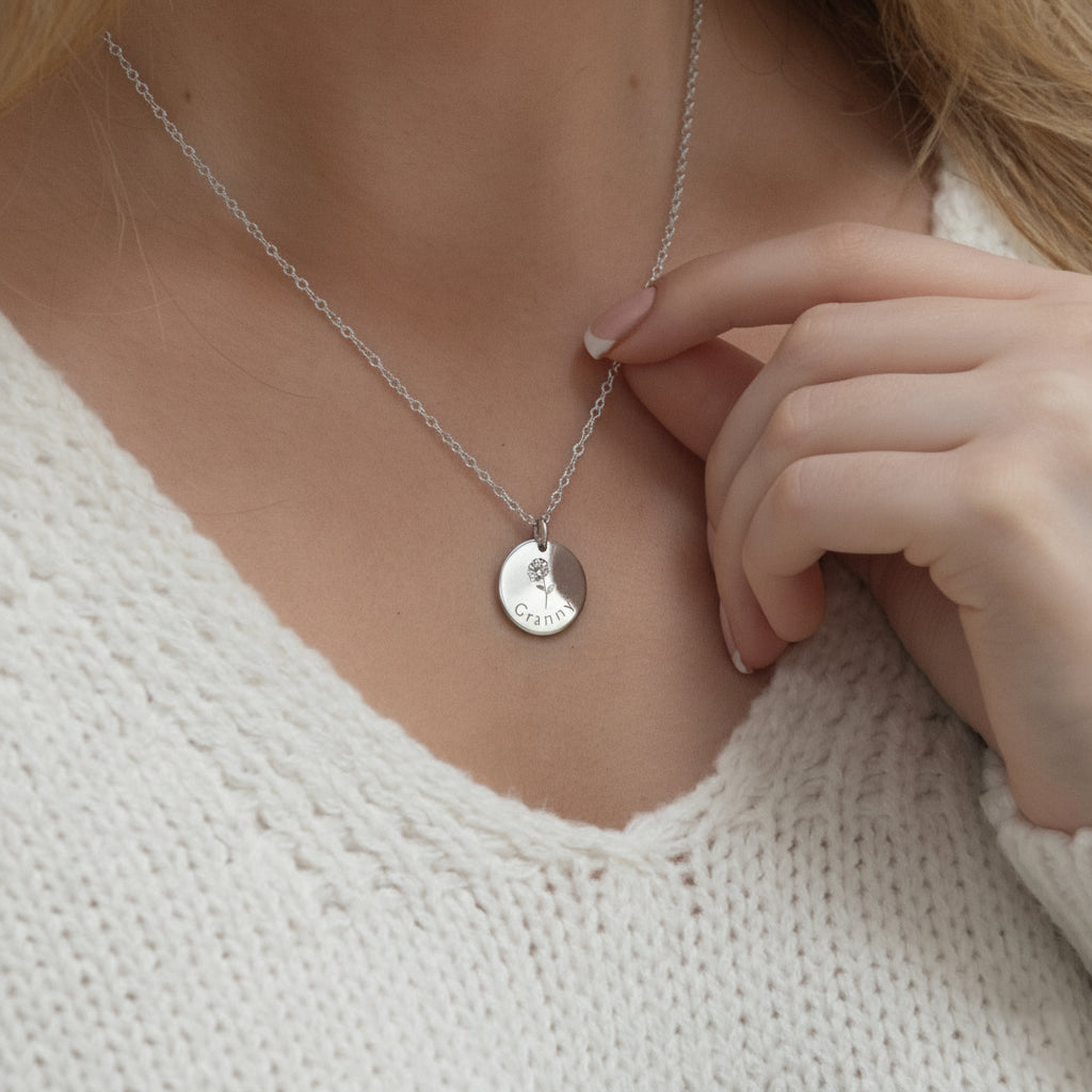 Sterling silver personalised grandmother necklace worn on the neck, front view.
