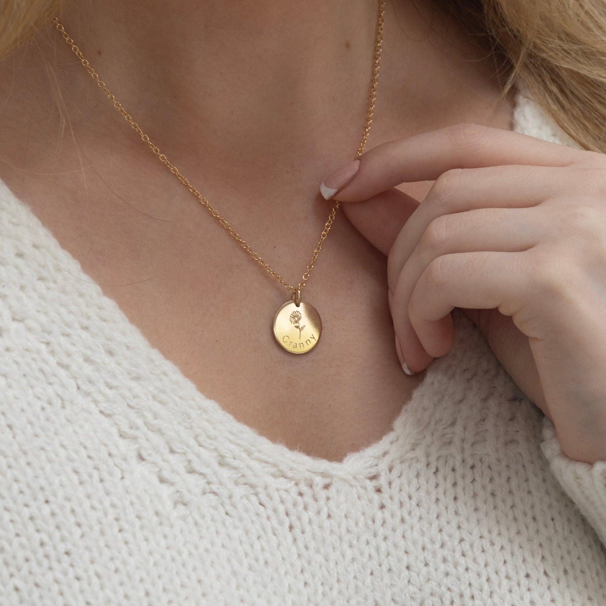 Front view of the personalised grandmother necklace worn on the neck, shown in a close-up.