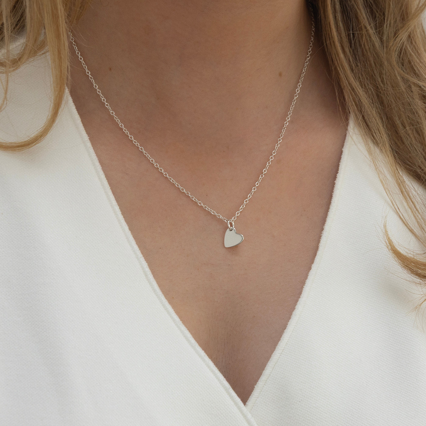 Silver birthstone necklace with heart initial